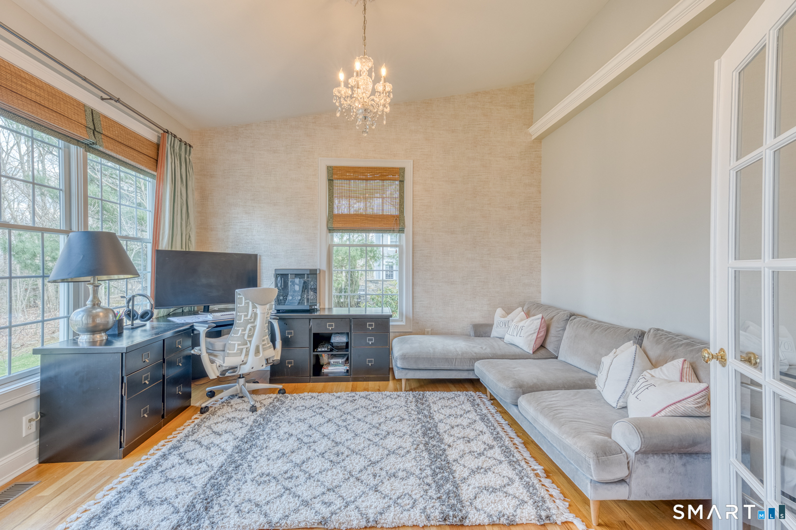 133 Feldspar Ridge Glastonbury, CT 06033 - Photo 30 of 56 a living room with fireplace furniture and a flat screen tv