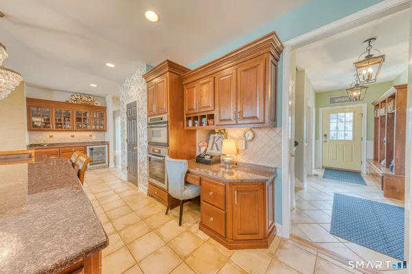 a view of a entryway door with wooden floor