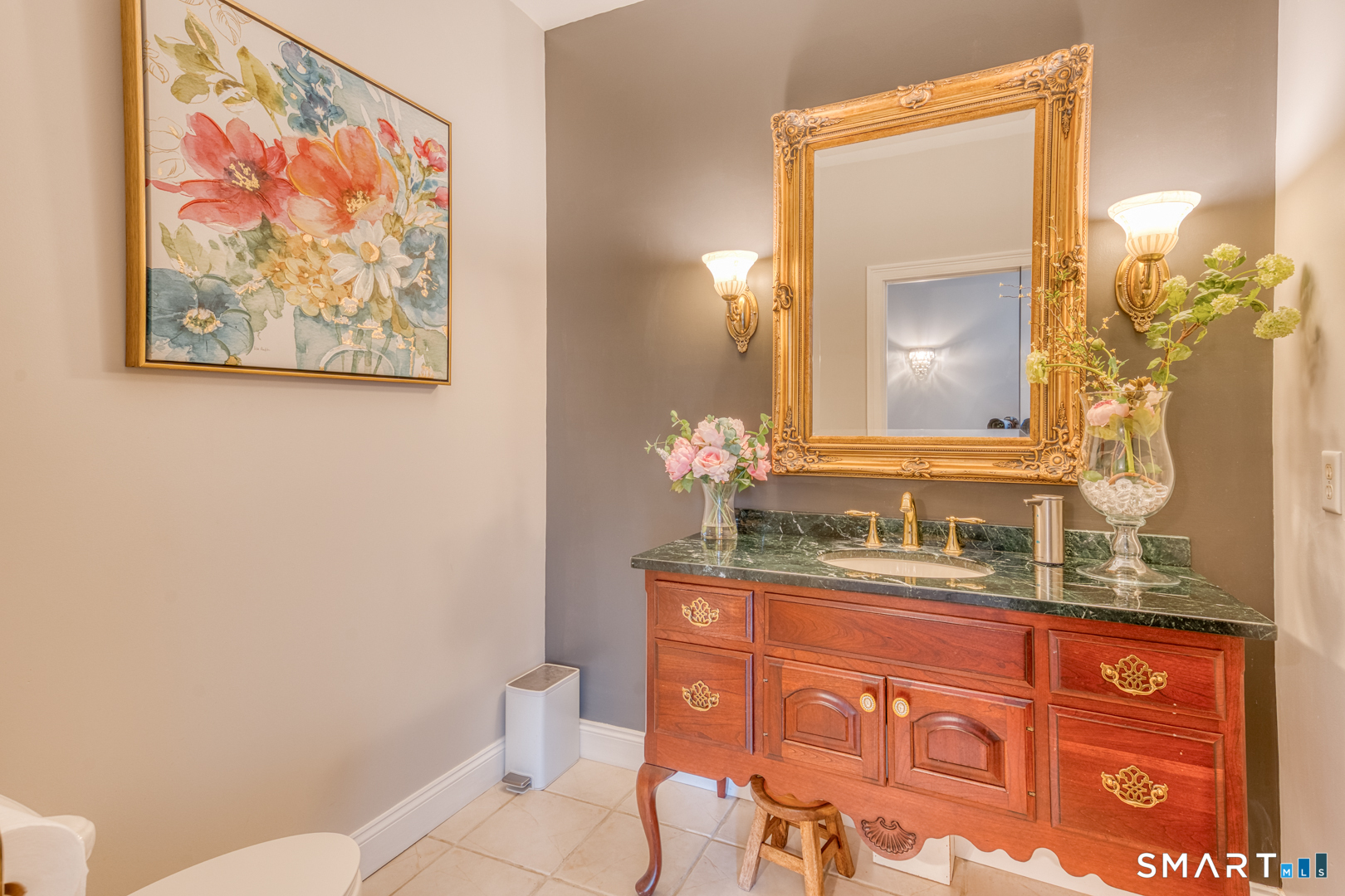 133 Feldspar Ridge Glastonbury, CT 06033 - Photo 38 of 56 a bathroom with a toilet sink and mirror