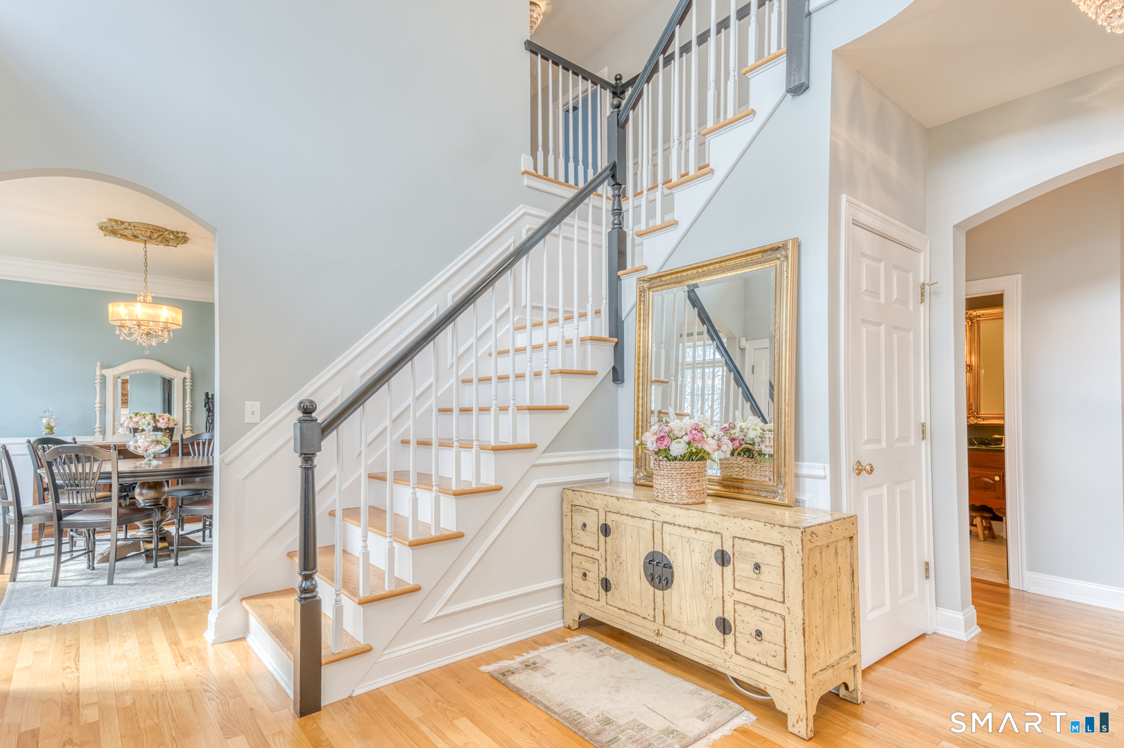 133 Feldspar Ridge Glastonbury, CT 06033 - Photo 39 of 56 a view of entryway dining room and hall with wooden floor