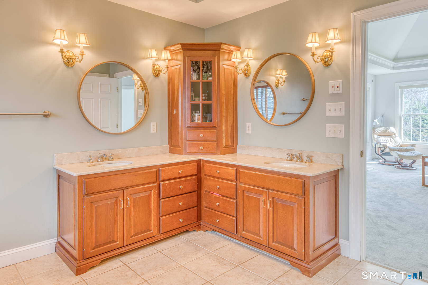133 Feldspar Ridge Glastonbury, CT 06033 - Photo 42 of 56 a bathroom with a double vanity sink and a mirror