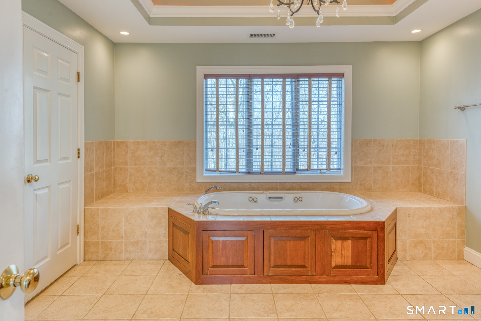 133 Feldspar Ridge Glastonbury, CT 06033 - Photo 44 of 56 a spacious bathroom with a tub sink and mirror