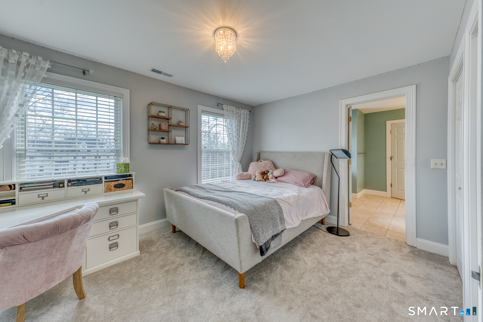 133 Feldspar Ridge Glastonbury, CT 06033 - Photo 46 of 56 a bedroom with a bed and a large window