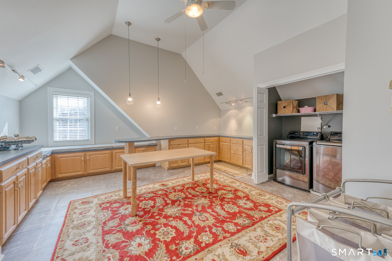 133 Feldspar Ridge Glastonbury, CT 06033 - Photo 51 of 56 a bedroom with a bed and a view of kitchen