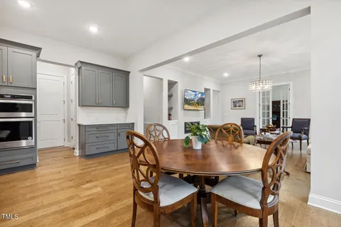 a bathroom with a toilet a sink and a mirror