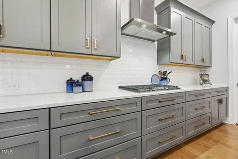 a bathroom with a shower a toilet and sink