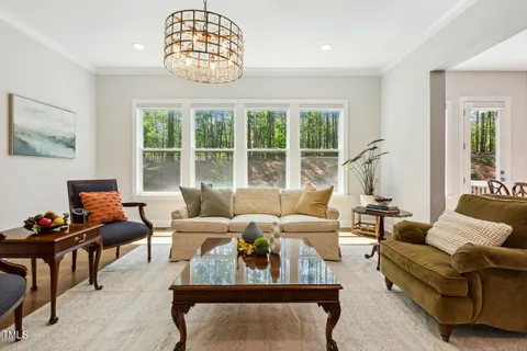 a front view of a house with a yard and pathway