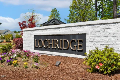 a kitchen with sink cabinets and window