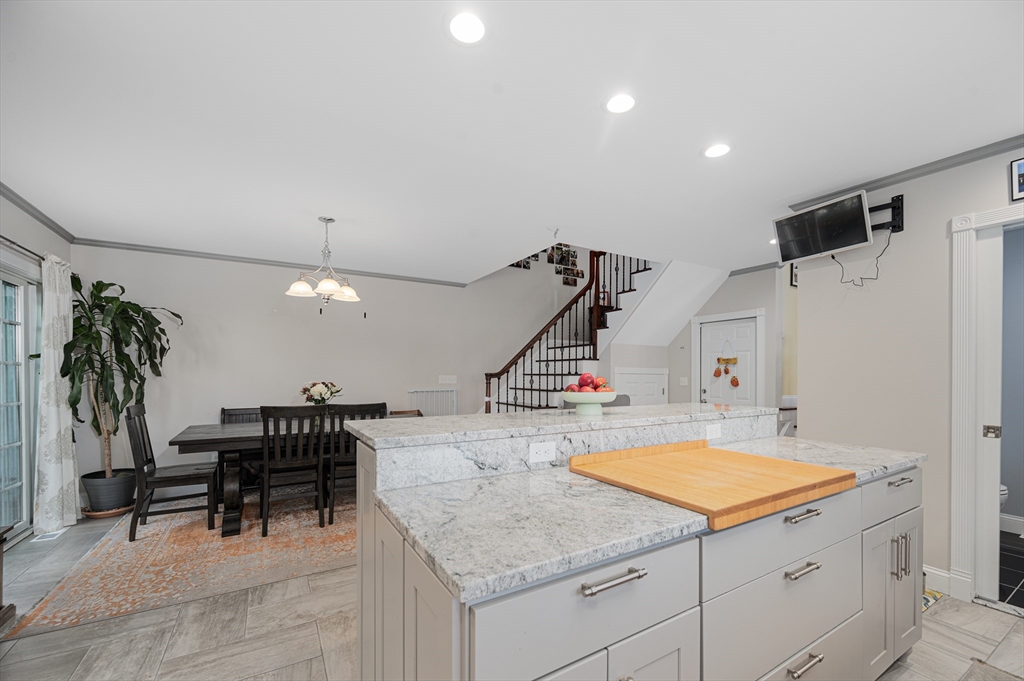 267 Lincoln Avenue Fall River, MA 02720 - Photo 17 of 41 a kitchen with a sink a counter and appliances