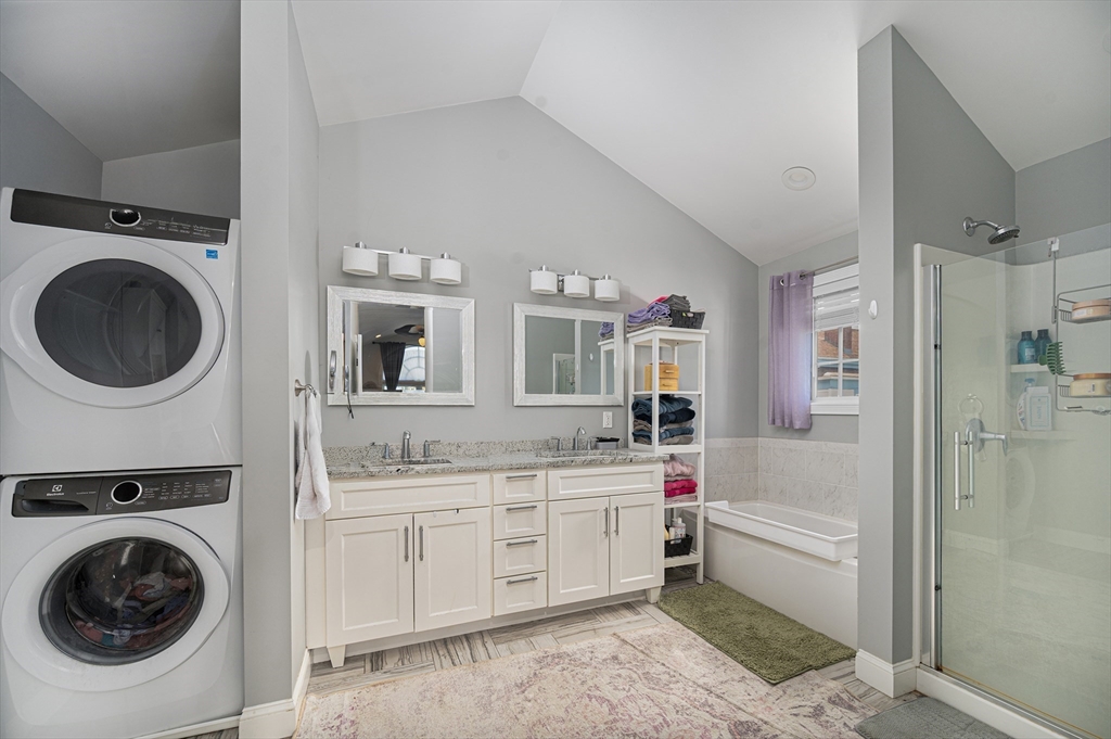 267 Lincoln Avenue Fall River, MA 02720 - Photo 27 of 41 a bathroom with a sink a washer and dryer