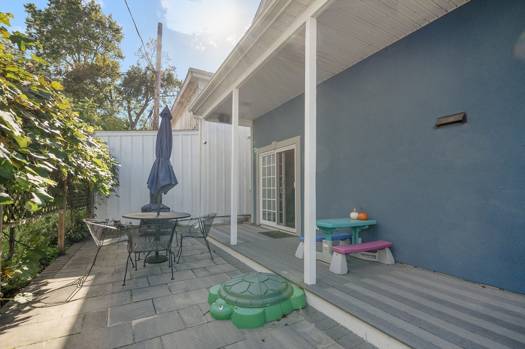 267 Lincoln Avenue Fall River, MA 02720 - Photo 40 of 41 a building outdoor space with patio furniture and potted plants