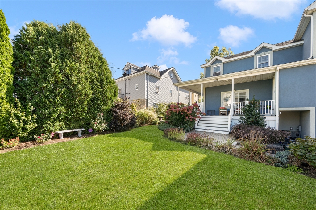 267 Lincoln Avenue Fall River, MA 02720 - Photo 8 of 41 a front view of a house with a yard