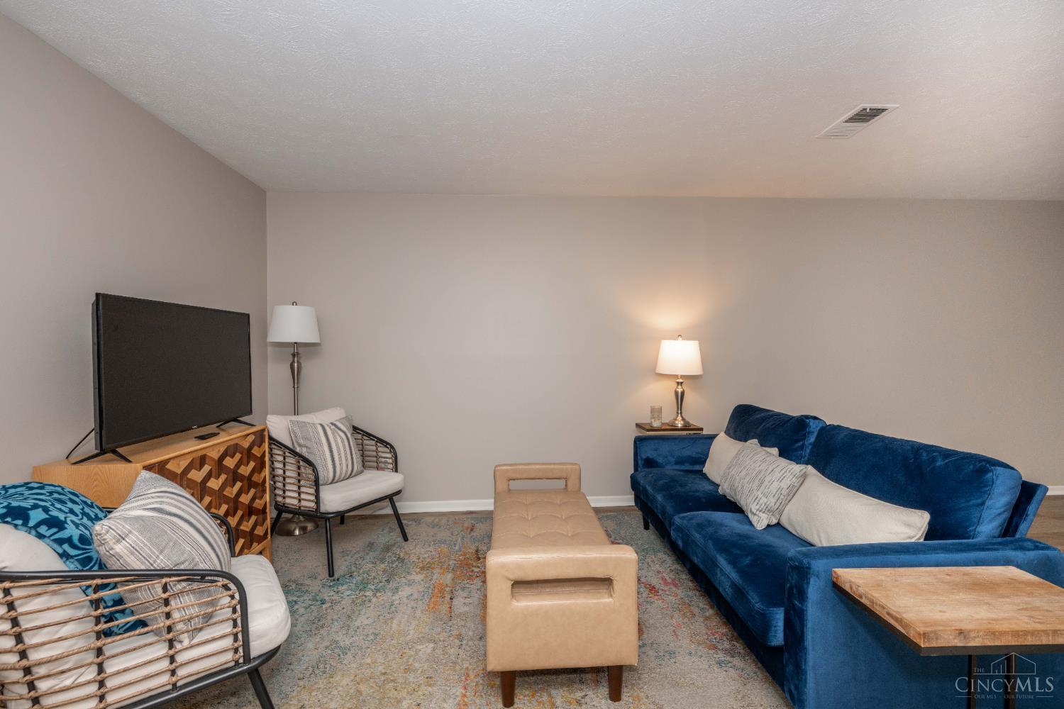 518 Riddle Road, Unit 7 Cincinnati, OH 45220 - Photo 6 of 43 Open spacious living room, great for entertaining also features LVP flooring.