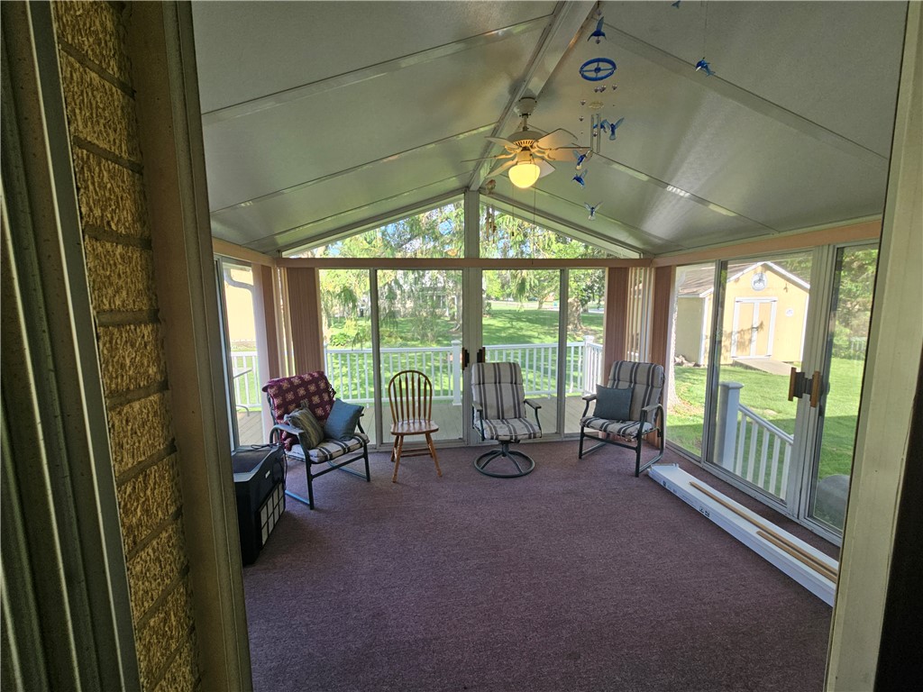 3998 Willowcrest Road Beavercreek, OH 45430 - Photo 30 of 41 This bright sunroom provides a delightful space for relaxation with panoramic outdoor views.