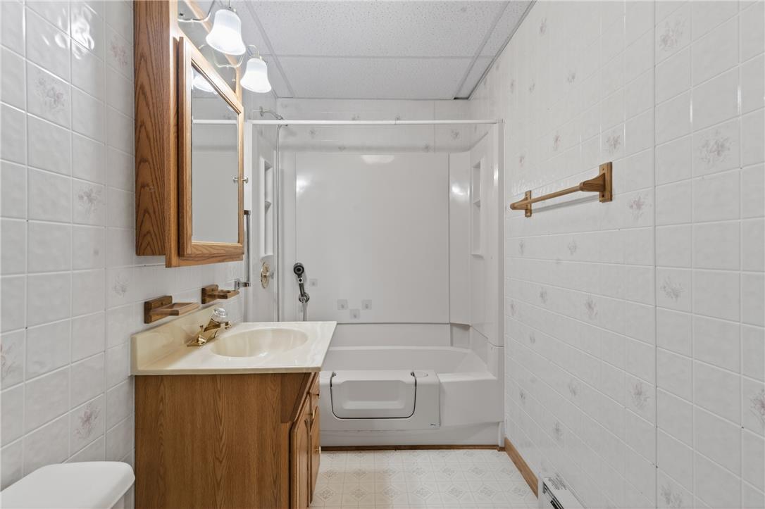 18 White Oak Road Nesquehoning, PA 18240 - Photo 28 of 52 A well-maintained bathroom with a walk-in tub and a functional vanity.