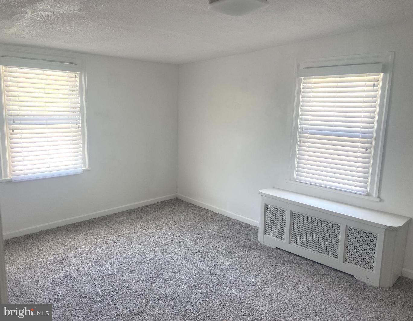 163 Klockner Road Trenton, NJ 08619 - Photo 16 of 22 an empty room with a window