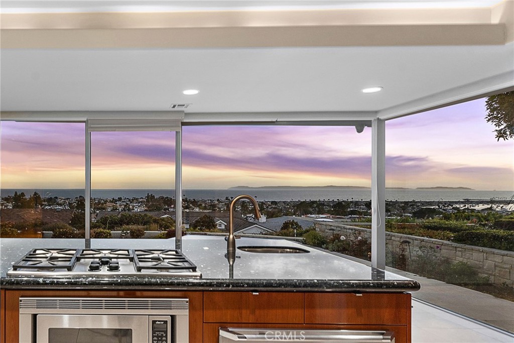 2801 Setting Sun Drive Corona del Mar, CA 92625 - Photo 12 of 30 a kitchen with a large window