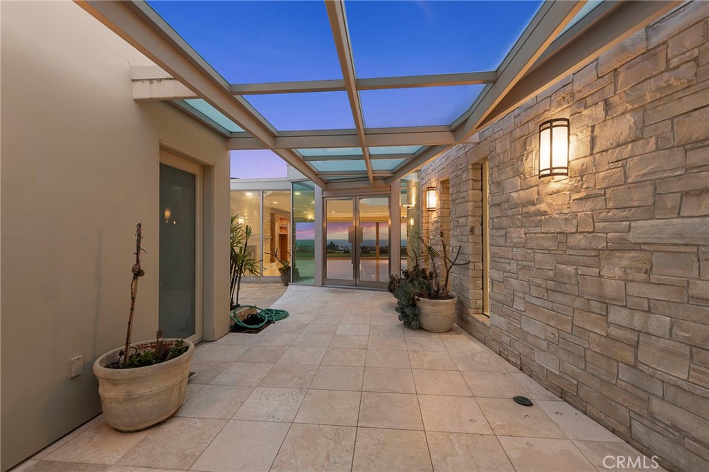 2801 Setting Sun Drive Corona del Mar, CA 92625 - Photo 3 of 30 a view of a hallway with seating area