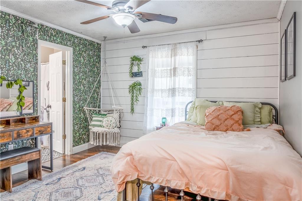 1280 Ragan Road Douglasville, GA 30134 - Photo 23 of 33 a bedroom with a large bed and a window