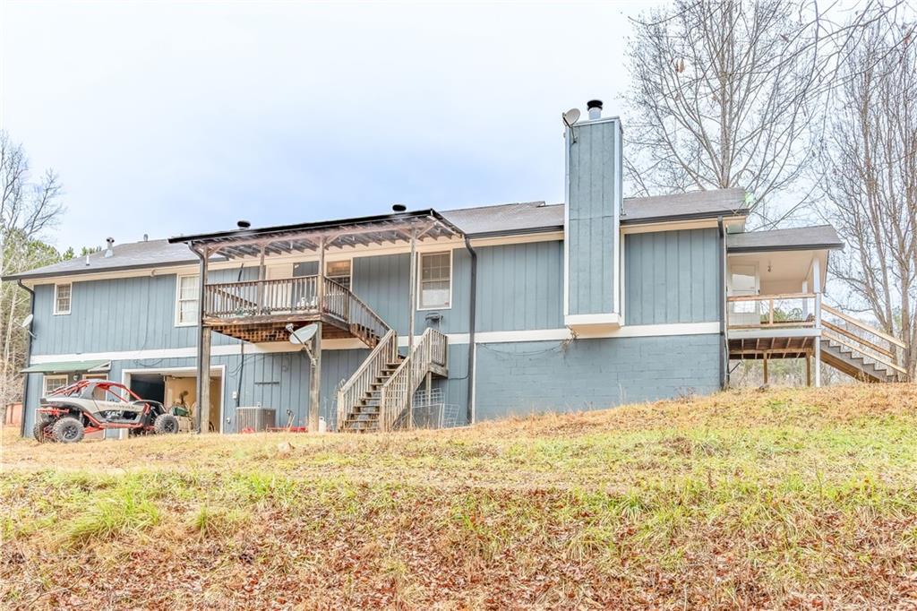 1280 Ragan Road Douglasville, GA 30134 - Photo 29 of 33 a house view with a outdoor space
