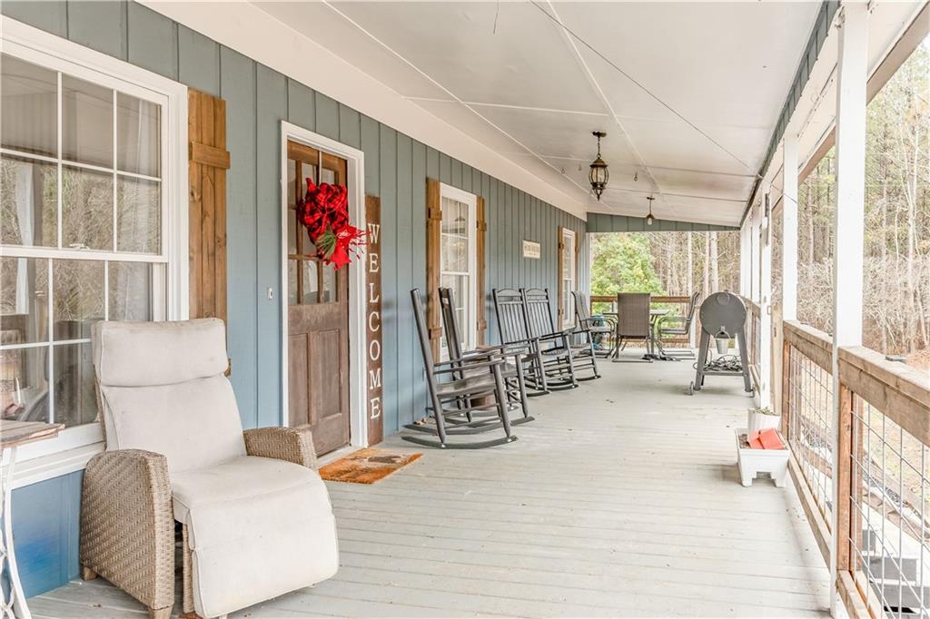1280 Ragan Road Douglasville, GA 30134 - Photo 4 of 33 a living room with furniture and a large window