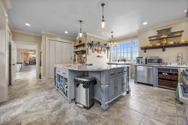 a view of a livingroom with furniture and wooden floor