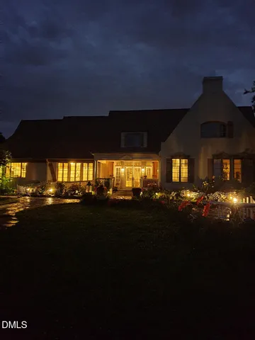 a kitchen with stainless steel appliances kitchen island granite countertop a refrigerator and a stove