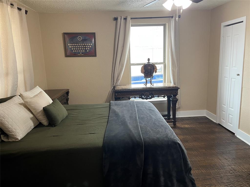 3610 Bertrand Avenue Dallas, TX 75210 - Photo 3 of 10 a bedroom with a bed and window