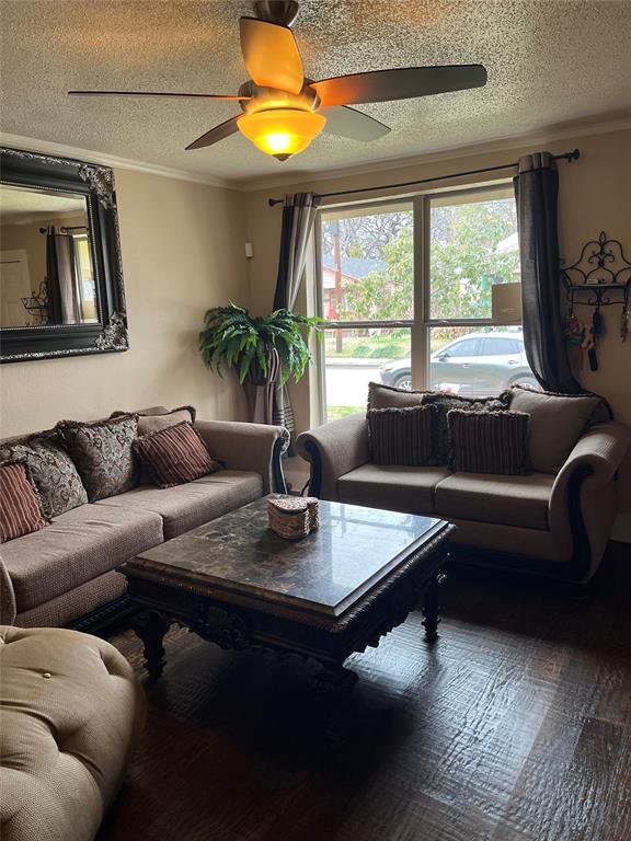 3610 Bertrand Avenue Dallas, TX 75210 - Photo 5 of 10 a living room with furniture and a large window