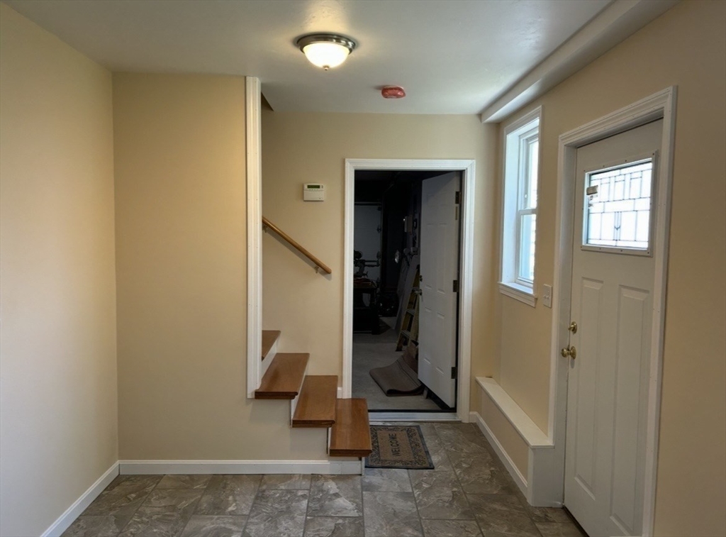67 Newport Road Hull, MA 02045 - Photo 23 of 26 walk in closet with view of bathroom