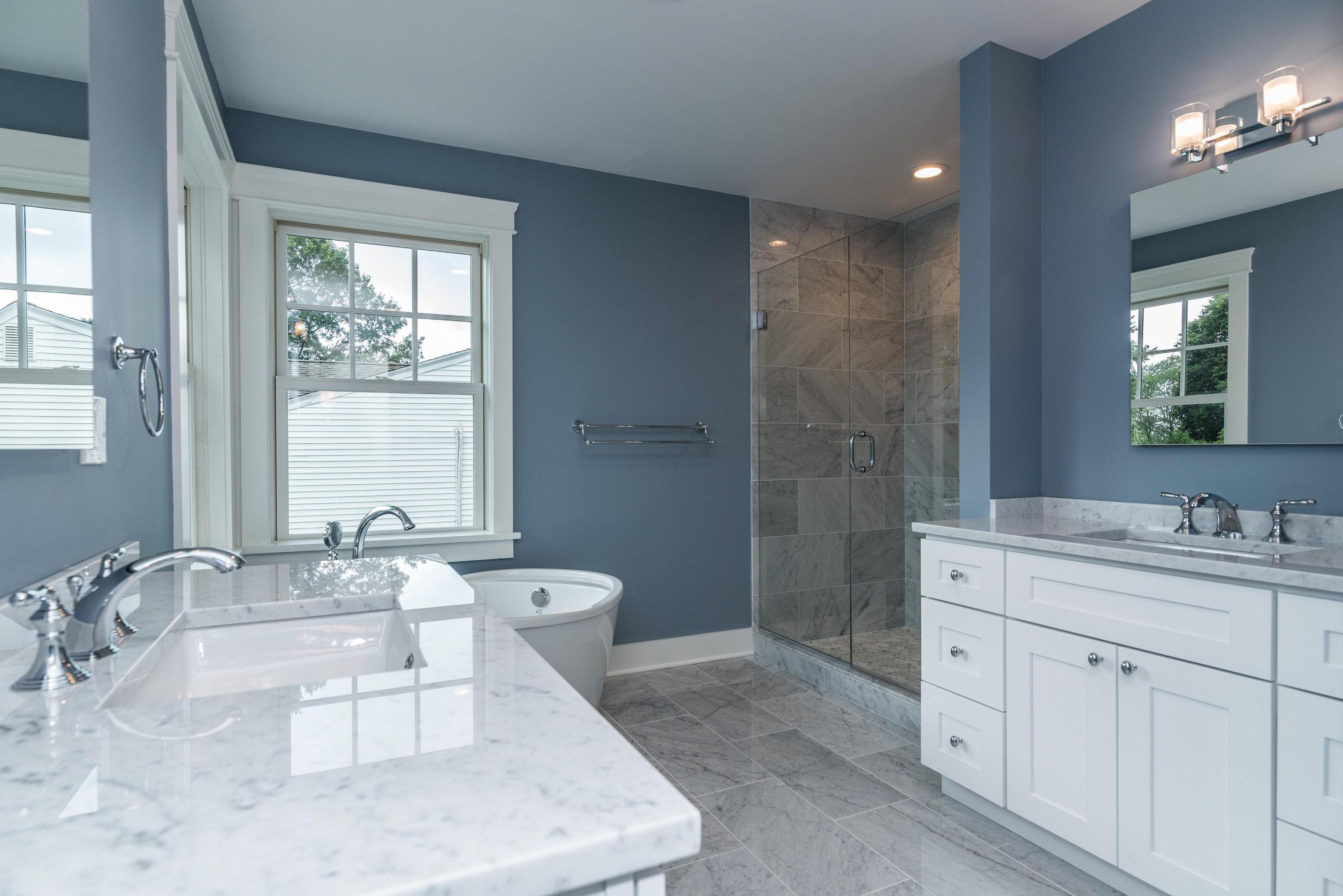 37 Ridgeley Street Darien, CT 06820 - Photo 12 of 24 a bathroom with a sink a toilet and shower
