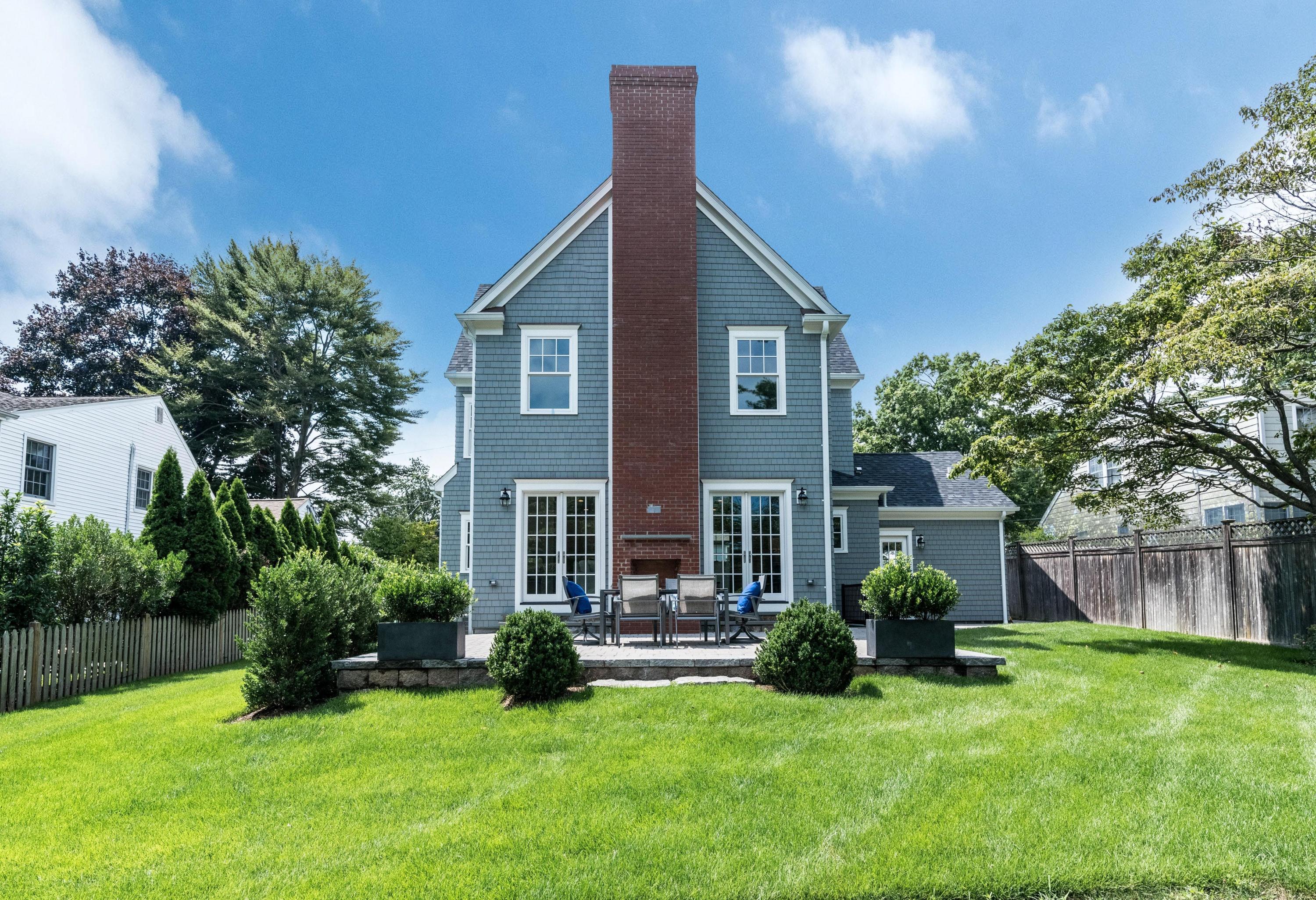 37 Ridgeley Street Darien, CT 06820 - Photo 22 of 24 a view of house with yard and green space