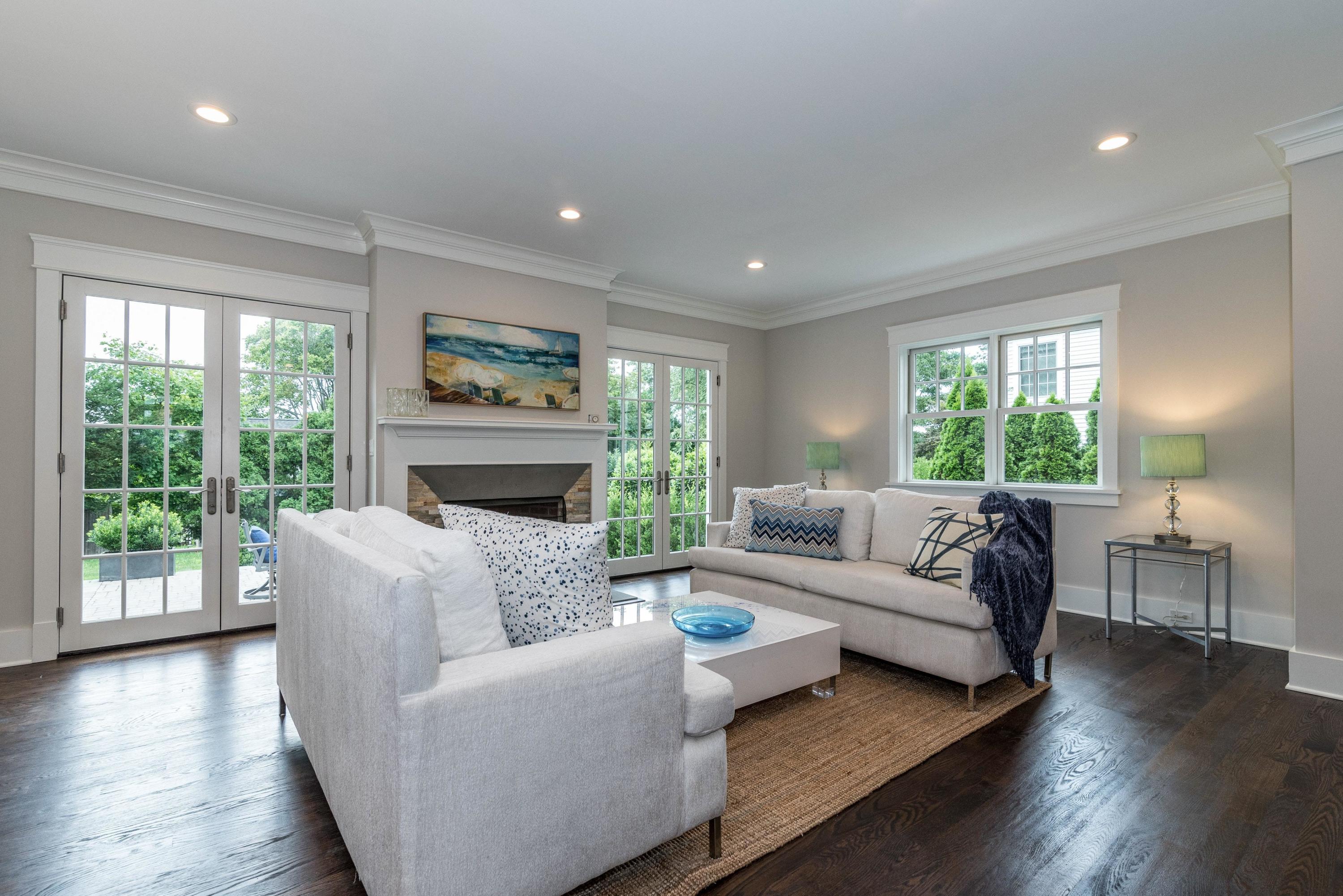 37 Ridgeley Street Darien, CT 06820 - Photo 6 of 24 a living room with furniture and a fireplace
