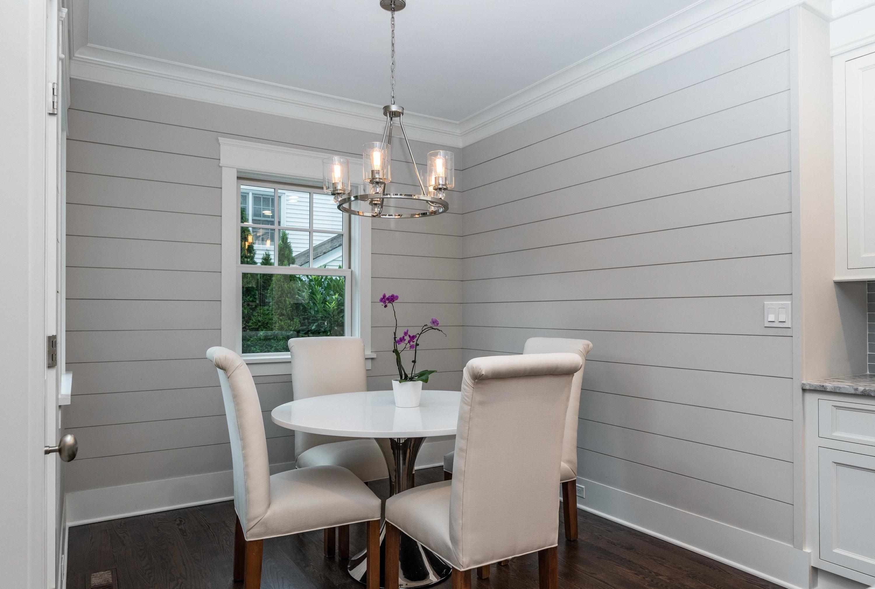 37 Ridgeley Street Darien, CT 06820 - Photo 8 of 24 a view of a dining room with furniture and chandelier