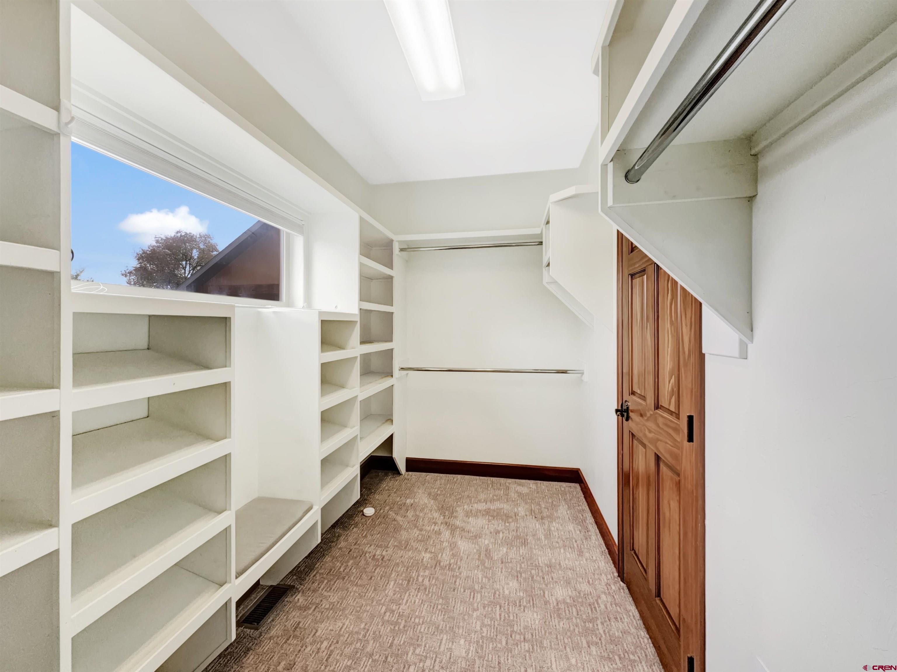 1794 Roubideau Street Delta, CO 81416 - Photo 14 of 35 a view of a hallway with closet