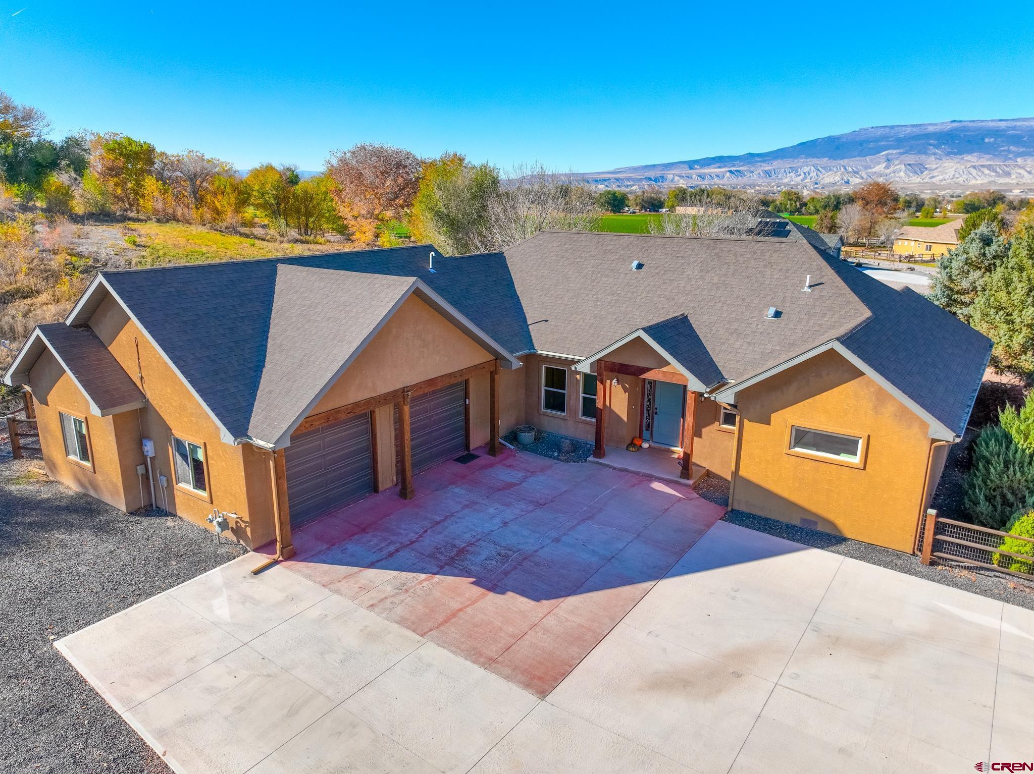 1794 Roubideau Street Delta, CO 81416 - Photo 2 of 35 a aerial view of a house with a big yard