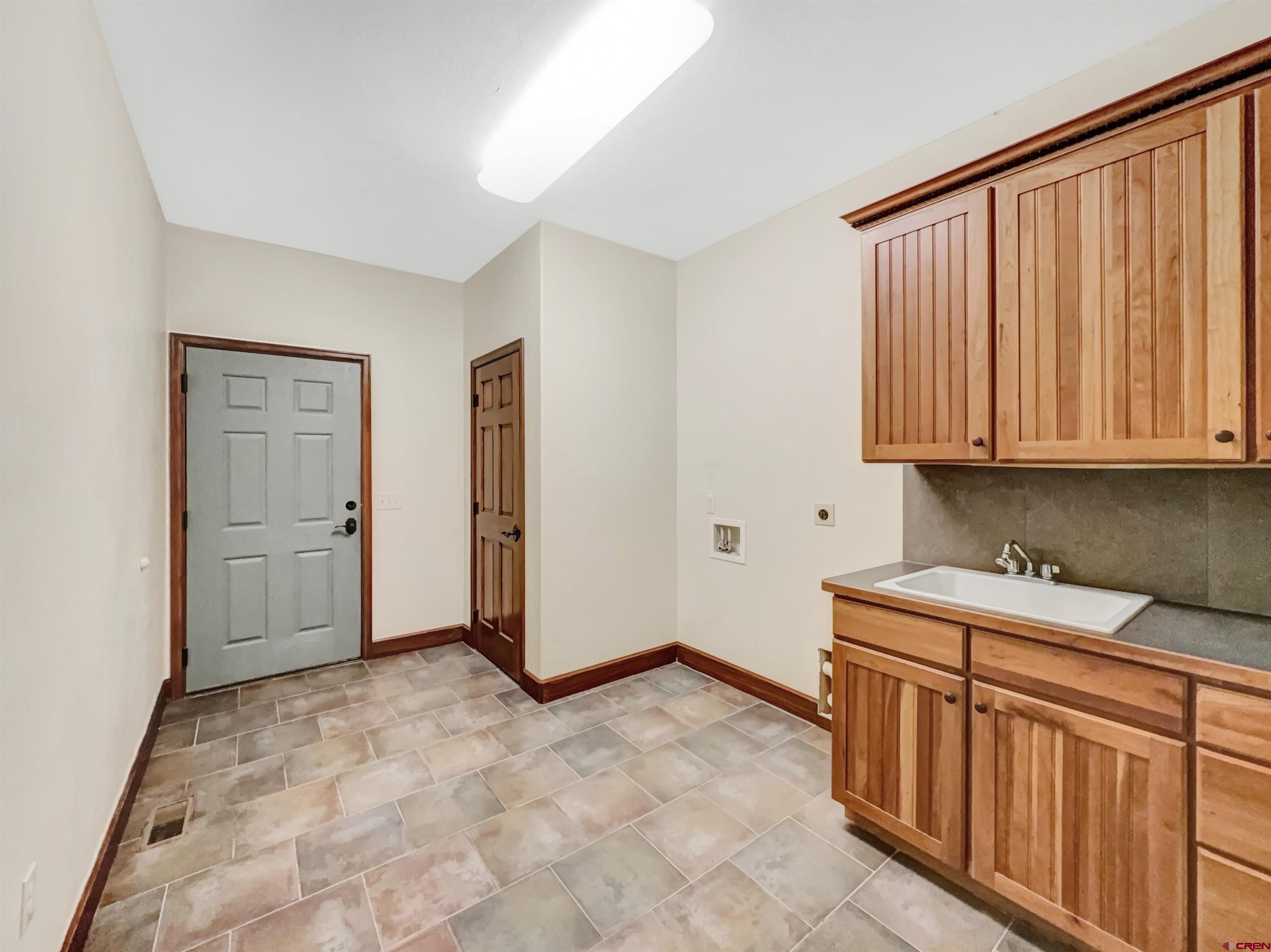 1794 Roubideau Street Delta, CO 81416 - Photo 24 of 35 a view of a kitchen with electric appliances