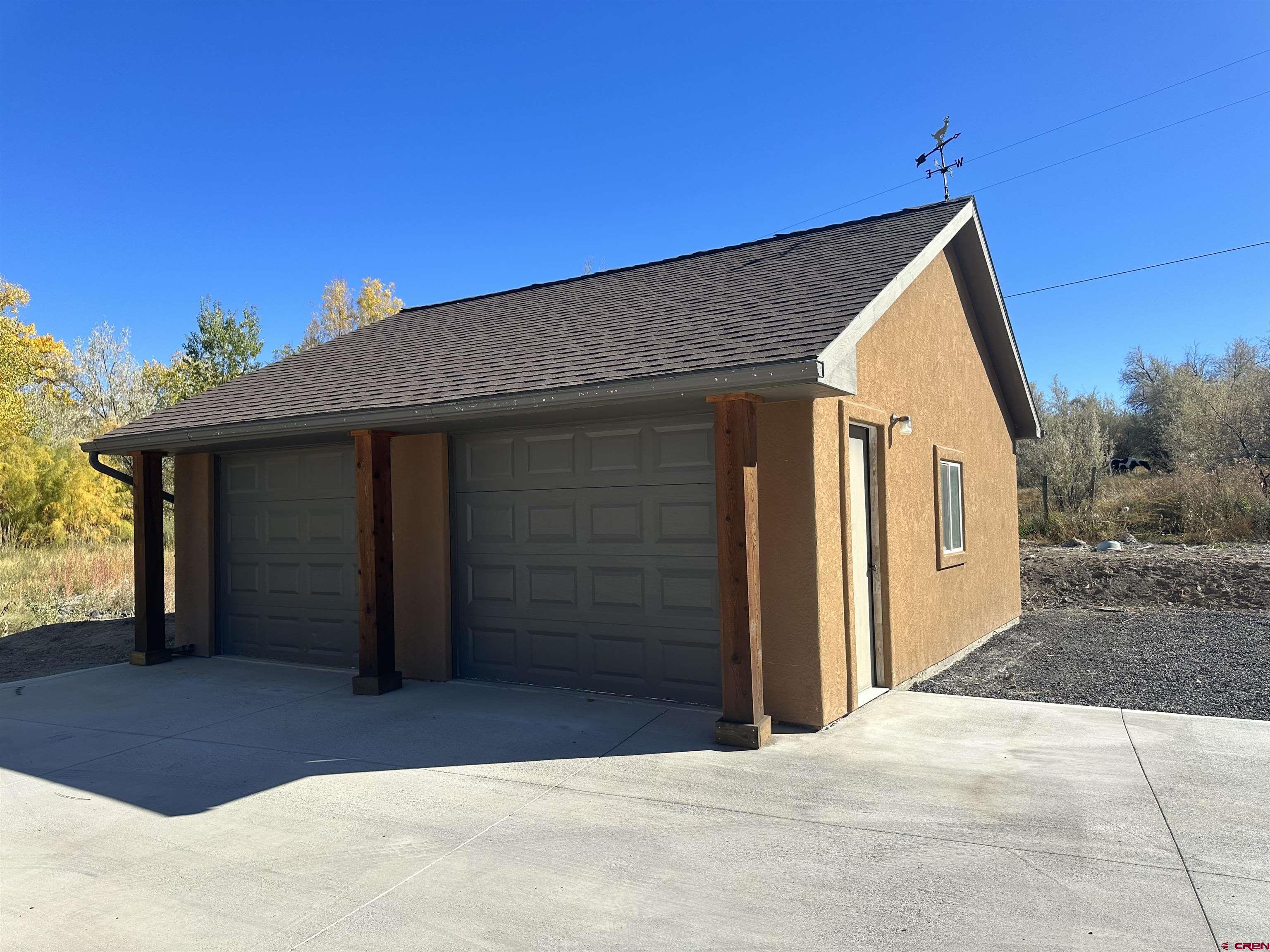 1794 Roubideau Street Delta, CO 81416 - Photo 34 of 35 a view of a house with a backyard