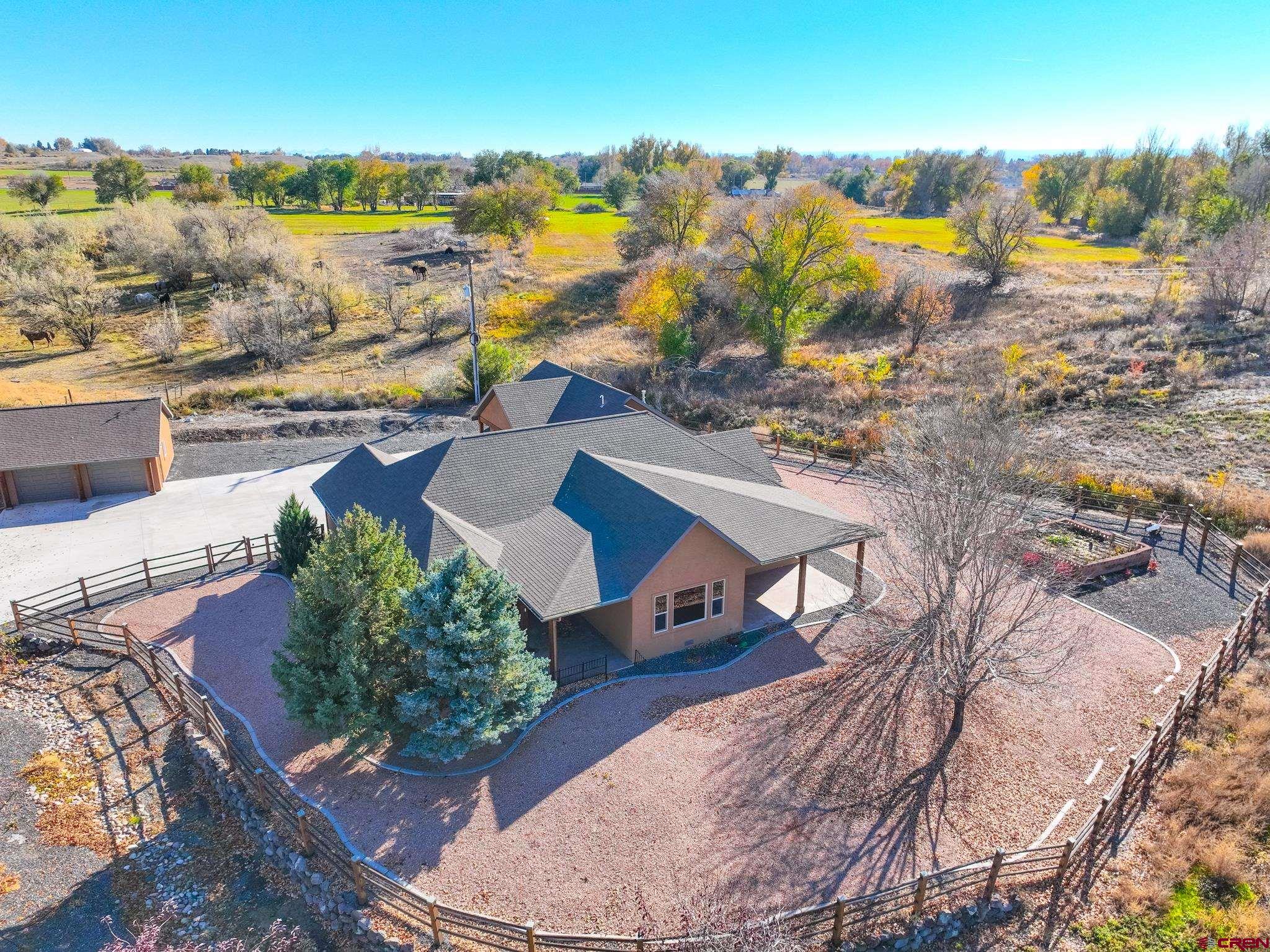 1794 Roubideau Street Delta, CO 81416 - Photo 35 of 35 a view of a house with a yard