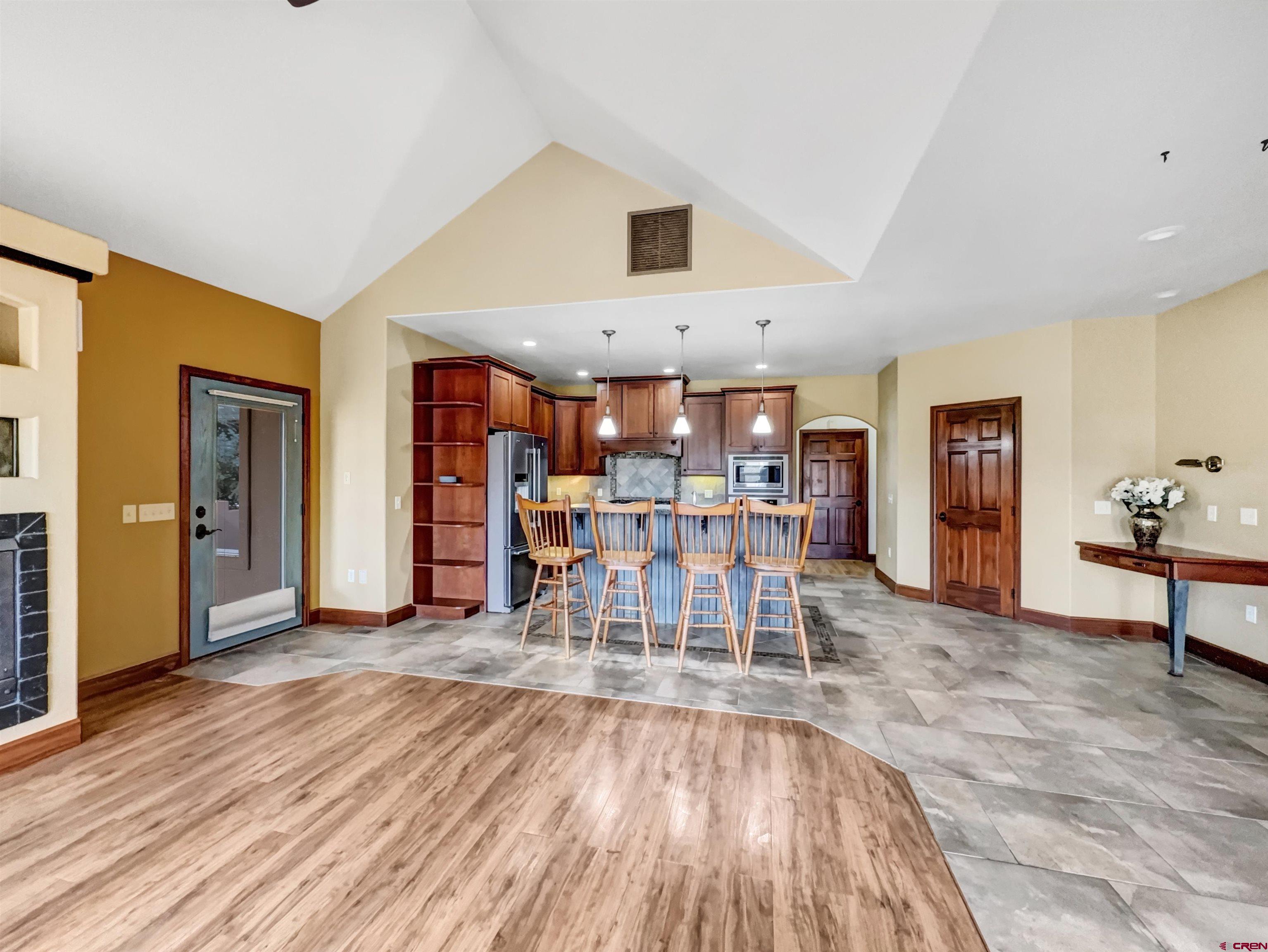 1794 Roubideau Street Delta, CO 81416 - Photo 5 of 35 a view of a a dining room with furniture window and wooden floor