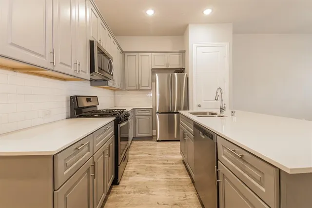 a front view of a multi story residential apartment building