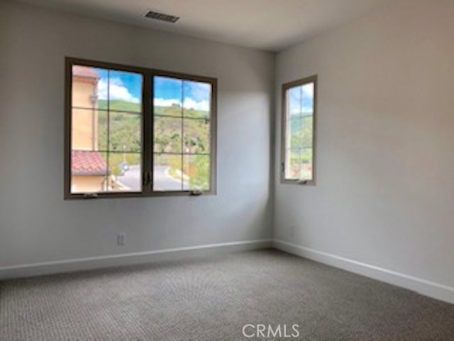 67 Tundra Irvine, CA 92602 - Photo 18 of 30 an empty room with a window