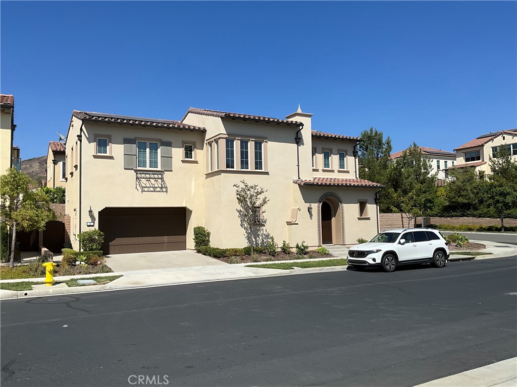 67 Tundra Irvine, CA 92602 - Photo 2 of 30 a view of a car parked in front of a house