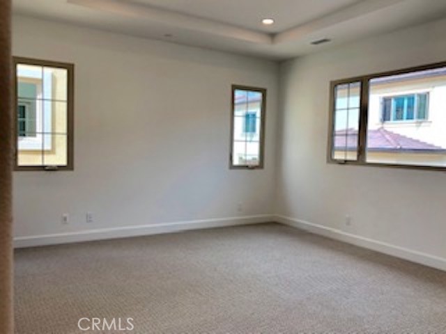67 Tundra Irvine, CA 92602 - Photo 20 of 30 an empty room with a window