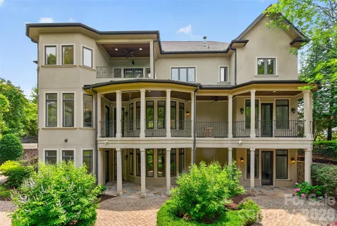 front view of a house with a garden