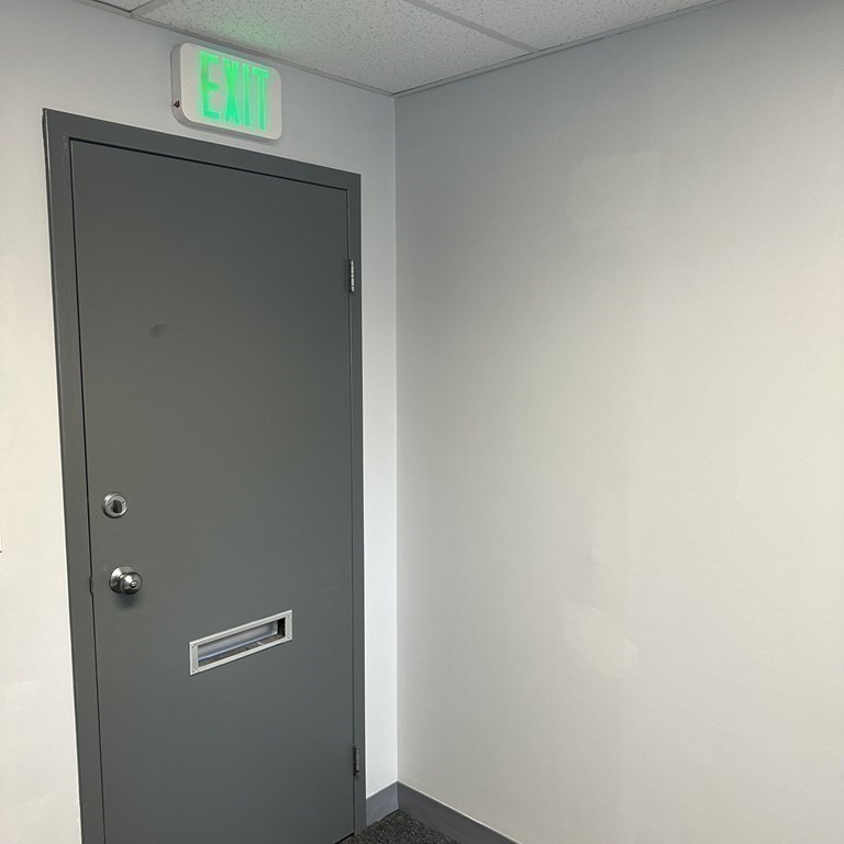 10 Tower Pk Drive, Unit 410 Woburn, MA 01801 - Photo 13 of 23 a view of cupboard