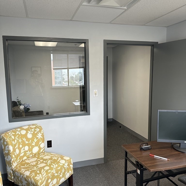10 Tower Pk Drive, Unit 410 Woburn, MA 01801 - Photo 16 of 23 a workspace with furniture and window