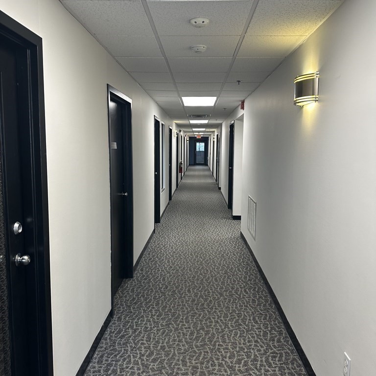 10 Tower Pk Drive, Unit 410 Woburn, MA 01801 - Photo 7 of 23 a view of hallway