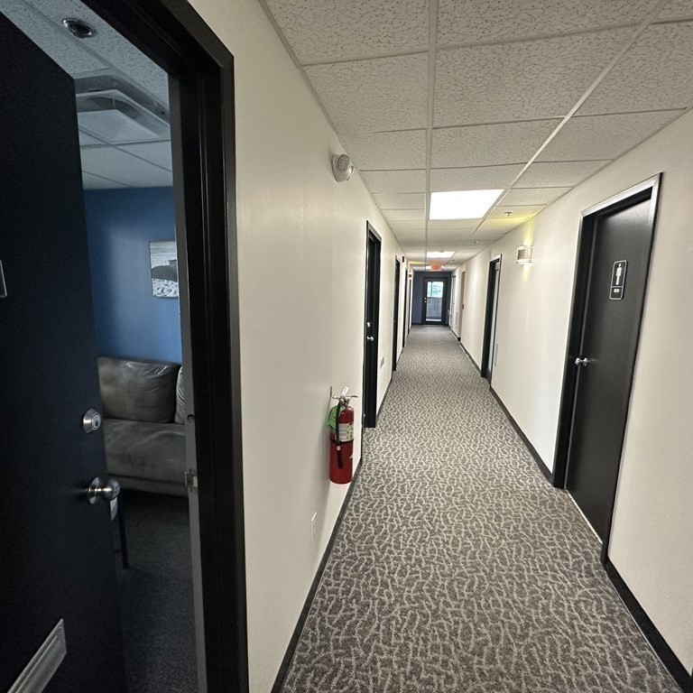 10 Tower Pk Drive, Unit 410 Woburn, MA 01801 - Photo 8 of 23 a view of hallway