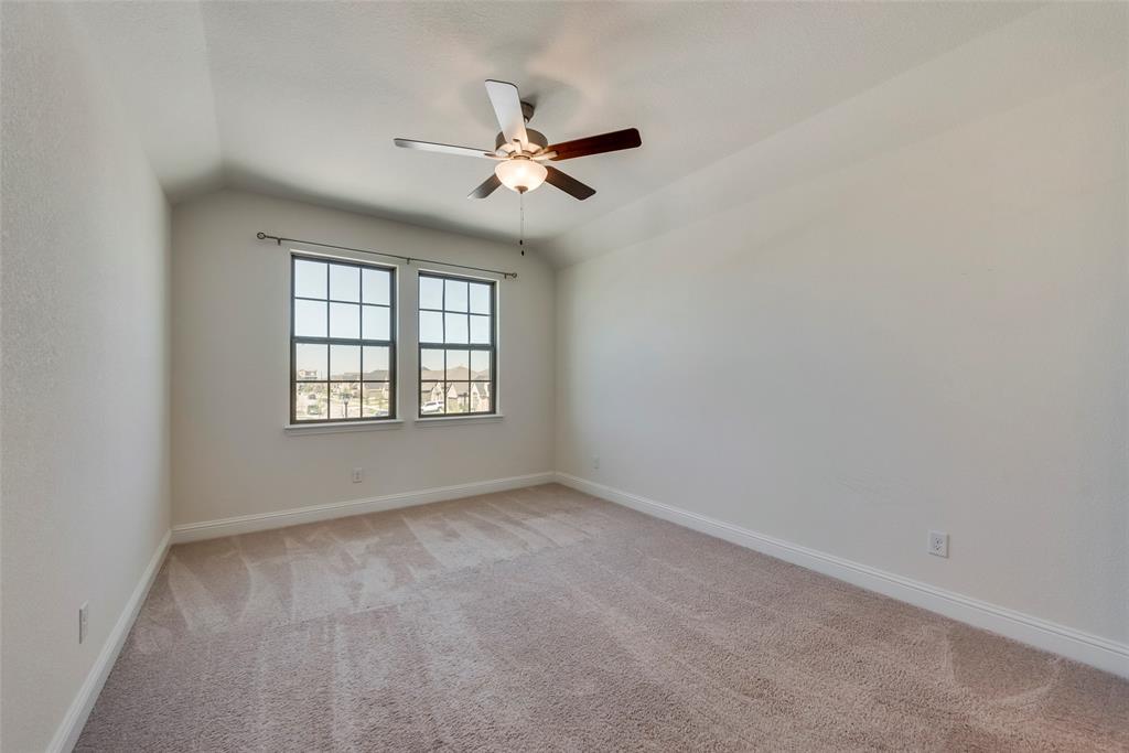 16476 Ryder Rock Road Frisco, TX 75033 - Photo 32 of 40 First Upstairs bedroom